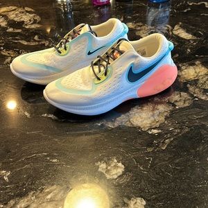 Ladies Nike Joyride sneakers. Perfect condition, white with pops of colour!